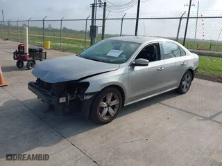 2013 Volkswagen Passat SE with VIN 1VWBP7A38DC086021, listed as a IAAI auction lot 41912361 with 215,843 mi miles. Bid and sale history available at carsss.com. Image 2.
