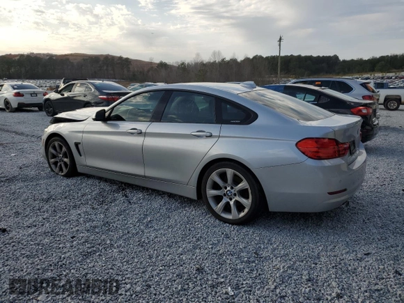2015 BMW 4 Series 428i with VIN WBA4A5C59FG051139, listed as a Copart auction lot 45186185 with 141,839 mi miles and Clean Title. Bid and sale history available at DreamBid. Image 2.