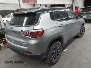 2020 Jeep Compass Trailhawk with VIN 3C4NJDDB7LT203447, listed as a IAAI auction lot 42637452 with 113,896 mi miles and . Bid and sale history available at DreamBid. Image 4.