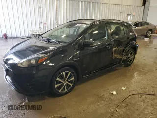 2018 Toyota Prius One z VIN JTDKDTB32J1604294, wystawiony jako Copart lot #87372644 z przebiegiem 99 035 mil mil oraz Szkoda całkowita • Salvage title. Historia ofert i sprzedaży dostępna na DreamBid. Obrazek 1.