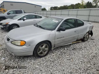 2002 Pontiac Grand Am with VIN 1G2NF12E32C202940, listed as a Copart auction lot 73576474 with 118,816 mi miles and Clean title. Bid and sale history available at DreamBid. Image 1.