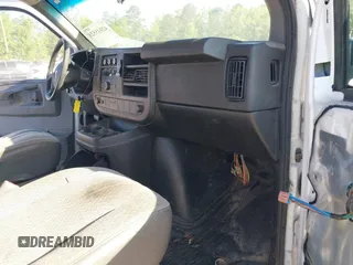 2014 Chevrolet Express Cargo Van with VIN 1GCSGAFX2E1151373, listed as a IAAI auction lot 42045528 with 123,718 mi miles. Bid and sale history available at carsss.com. Image 5.