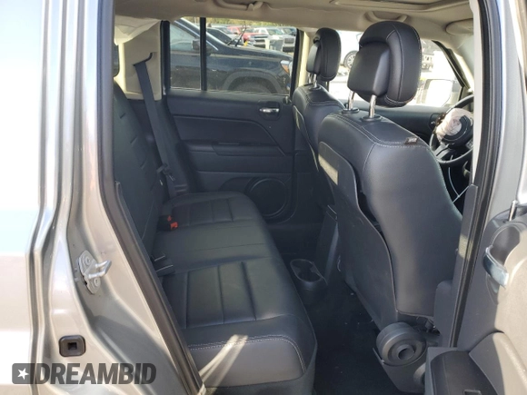 2015 Jeep Patriot High Altitude with VIN 1C4NJRFB2FD270543, listed as a Copart auction lot 53448165 with 141,048 mi miles and Salvage Title. Bid and sale history available at carsss.com. Image 12.