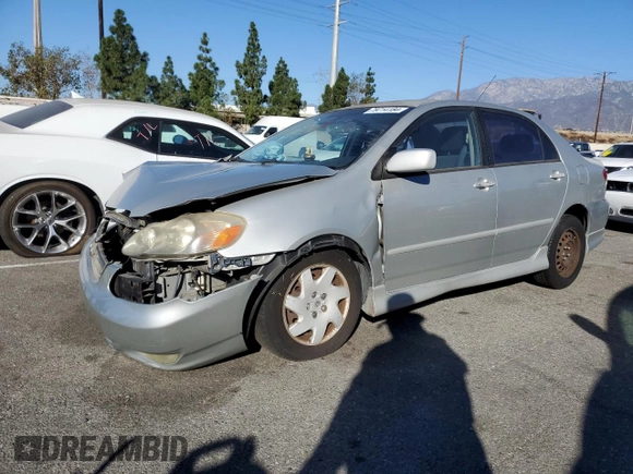 2003 Toyota Corolla CE with VIN 1NXBR32E13Z155142, listed as a Copart auction lot 79714184 with 299,999 mi miles and Salvage Title. Bid and sale history available at DreamBid. Image 1.