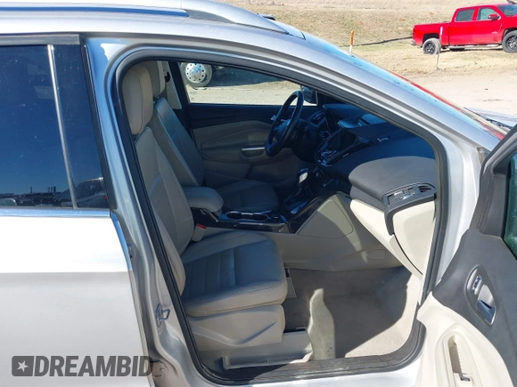 2014 Ford Escape Titanium with VIN 1FMCU0JX7EUC59643, listed as a IAAI auction lot 41082952 with 143,899 mi miles. Bid and sale history available at carsss.com. Image 5.