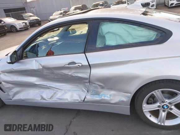 2015 BMW 4 Series 428i with VIN WBA3N7C52FK222743, listed as a IAAI auction lot 41602525 with 81,661 mi miles and . Bid and sale history available at DreamBid. Image 15.