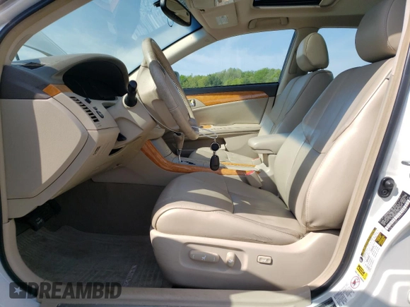 2007 Toyota Avalon XL z VIN 4T1BK36B27U215021, wystawiony jako Copart lot #56408185 z przebiegiem 202 572 mil mil oraz Czysty tytuł • Clean title. Historia ofert i sprzedaży dostępna na DreamBid. Obrazek 7.