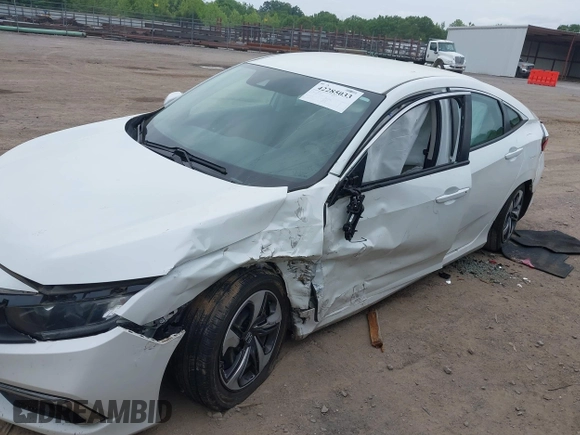 2020 Honda Civic LX z VIN 19XFC2F66LE021813, wystawiony jako IAAI lot #42285033 z przebiegiem 116 069 mil mil oraz . Historia ofert i sprzedaży dostępna na DreamBid. Obrazek 6.