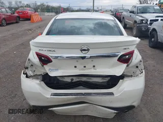 2017 Nissan Altima SR with VIN 1N4AL3APXHC152604, listed as a IAAI auction lot 41978787 with 104,268 mi miles and . Bid and sale history available at DreamBid. Image 16.