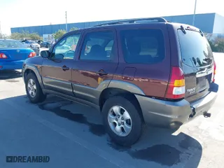 2001 Mazda Tribute LX with VIN 4F2YU08131KM39817, listed as a IAAI auction lot 41678877 with 210,715 mi miles. Bid and sale history available at carsss.com. Image 3.
