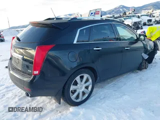 2015 Cadillac SRX Premium Collection with VIN 3GYFNGE38FS593965, listed as a IAAI auction lot 41602374 with 97,949 mi miles. Bid and sale history available at carsss.com. Image 4.