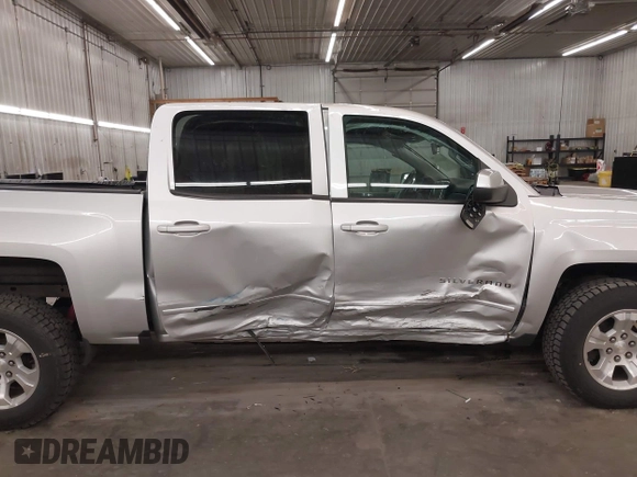 2017 Chevrolet Silverado 1500 LT with VIN 3GCUKREC5HG318772, listed as a IAAI auction lot 42056116 with 82,987 mi miles and . Bid and sale history available at DreamBid. Image 14.