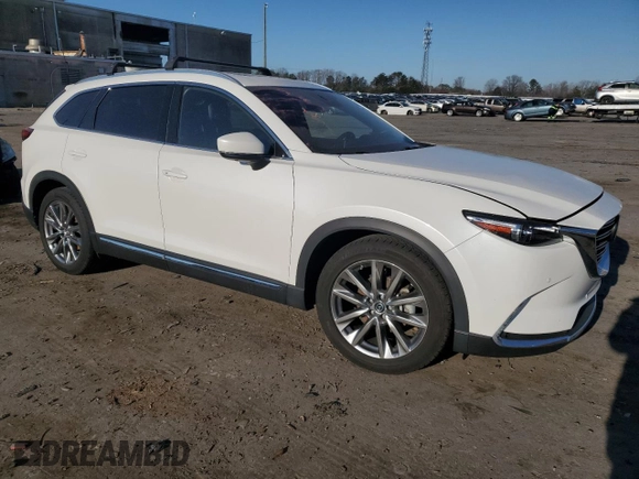 2019 Mazda CX-9 Grand Touring with VIN JM3TCBDY9K0328379, listed as a Copart auction lot 48310995 with 69,667 mi miles and Salvage Title. Bid and sale history available at carsss.com. Image 4.