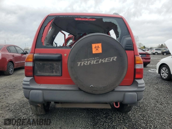2004 Chevrolet Tracker ZR2 z VIN 2CNBJ734946901101, wystawiony jako Copart lot #48592545 z przebiegiem Nie podano mil oraz Szkoda całkowita • Salvage title. Historia ofert i sprzedaży dostępna na DreamBid. Obrazek 6.