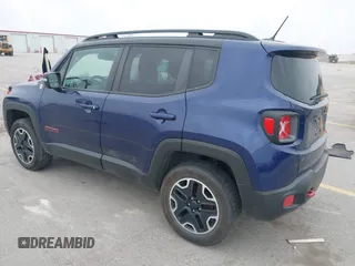 2016 Jeep Renegade Trailhawk with VIN ZACCJBCTXGPD30986, listed as a IAAI auction lot 41970876 with 55,814 mi miles and . Bid and sale history available at carsss.com. Image 3.