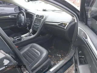2013 Ford Fusion SE Hybrid with VIN 3FA6P0LU0DR176353, listed as a IAAI auction lot 41591238 with 190,717 mi miles. Bid and sale history available at carsss.com. Image 5.