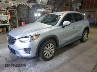 2016 Mazda CX-5 Sport z VIN JM3KE2BY2G0844082, wystawiony jako Copart lot #60539695 z przebiegiem 93 553 mil mil oraz Szkoda całkowita • Salvage title. Historia ofert i sprzedaży dostępna na DreamBid. Obrazek 1.