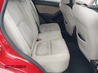 2016 Mazda CX-5 Sport with VIN JM3KE2BY9G0911535, listed as a IAAI auction lot 41906402 with 134,477 mi miles. Bid and sale history available at carsss.com. Image 8.