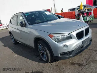 2014 BMW X1 sDrive28i with VIN WBAVM1C58EVW52847, listed as a IAAI auction lot 40779553 with 151,076 mi miles. Bid and sale history available at carsss.com. Image 1.