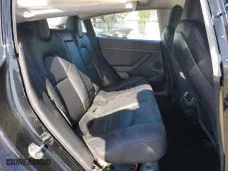 2021 Tesla Model 3 Standard Range Plus with VIN 5YJ3E1EAXMF027428, listed as a Copart auction lot 45730105 with 27,385 mi miles and Salvage Title. Bid and sale history available at carsss.com. Image 11.