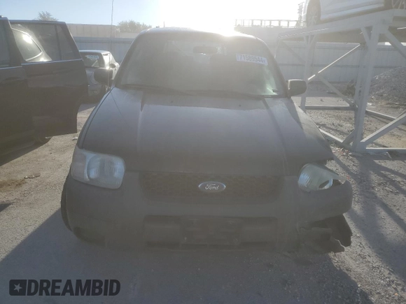 2004 Ford Escape XLS with VIN 1FMYU921X4KA14947, listed as a Copart auction lot 71589544 with 173,890 mi miles and Salvage Title. Bid and sale history available at DreamBid. Image 5.