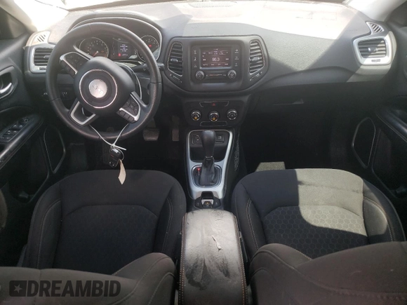2017 Jeep Compass Sport z VIN 3C4NJCAB3HT652338, wystawiony jako Copart lot #63076055 z przebiegiem 109 701 mil mil oraz Szkoda całkowita • Salvage title. Historia ofert i sprzedaży dostępna na DreamBid. Obrazek 8.