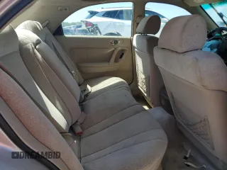 2000 Mazda Millenia with VIN JM1TA2210Y1614967, listed as a Copart auction lot 53606185 with 120,288 mi miles and Salvage Title. Bid and sale history available at DreamBid. Image 10.