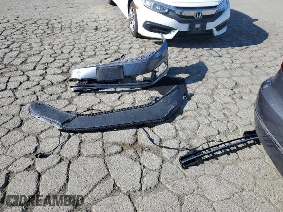 2017 Volkswagen Passat SE z VIN 1VWGT7A35HC078899, wystawiony jako Copart lot #55057695 z przebiegiem 45 620 mil mil oraz Szkoda całkowita • Salvage title. Historia ofert i sprzedaży dostępna na DreamBid. Obrazek 12.