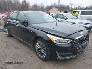 2018 Genesis G90 3.3T Premium with VIN KMHG34JA7JU041008, listed as a IAAI auction lot 41719369 with 146,874 mi miles. Bid and sale history available at carsss.com. Image 1.