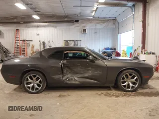 2016 Dodge Challenger SXT with VIN 2C3CDZAG7GH138288, listed as a IAAI auction lot 41128028 with 110,973 mi miles and . Bid and sale history available at DreamBid. Image 13.