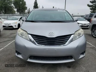 2012 Toyota Sienna with VIN 5TDKA3DC4CS014867, listed as a Copart auction lot 43191655 with 169,517 mi miles and Salvage Title. Bid and sale history available at DreamBid. Image 5.