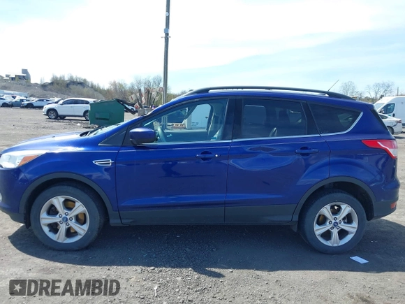 2013 Ford Escape SE with VIN 1FMCU9G95DUA76544, listed as a IAAI auction lot 42080309 with 167,821 mi miles and . Bid and sale history available at DreamBid. Image 14.