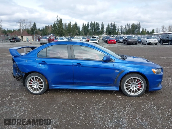 2015 Mitsubishi Lancer Evolution GSR with VIN JA32W8FV4FU012578, listed as a IAAI auction lot 41730742 with 64,762 mi miles. Bid and sale history available at carsss.com. Image 14.