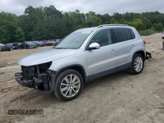 2013 Volkswagen Tiguan S with VIN WVGAV3AX3DW586260, listed as a Copart auction lot 61201215 with 57,103 mi miles and Salvage title. Bid and sale history available at DreamBid. Image 1.