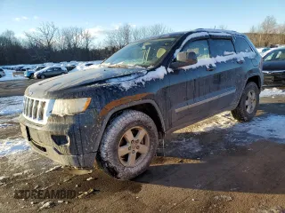 2011 Jeep Grand Cherokee Laredo with VIN 1J4RR4GGXBC669413, listed as a Copart auction lot 41730255 with 215,437 mi miles and Clean Title. Bid and sale history available at carsss.com. Image 1.