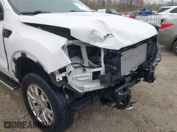2021 Ford Ranger XL z VIN 1FTER4FH6MLE00004, wystawiony jako IAAI lot #41983031 z przebiegiem 54 227 mil mil oraz . Historia ofert i sprzedaży dostępna na DreamBid. Obrazek 18.