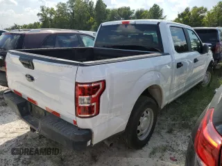 2019 Ford F-150 XL with VIN 1FTEW1CBXKKF14856, listed as a Copart auction lot 71306444 with 100,057 mi miles and Salvage title. Bid and sale history available at DreamBid. Image 3.