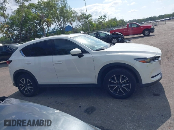 2018 Mazda CX-5 Grand Touring with VIN JM3KFBDM6J0451605, listed as a IAAI auction lot 42099182 with 81,703 mi miles and . Bid and sale history available at DreamBid. Image 13.