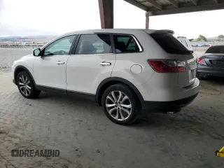 2012 Mazda CX-9 Grand Touring with VIN JM3TB3DV2C0336355, listed as a Copart auction lot 61687975 with 150,580 mi miles and Salvage title. Bid and sale history available at DreamBid. Image 2.