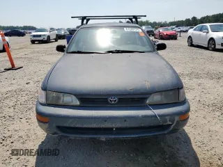 1994 Toyota Corolla Deluxe with VIN 2T1AE09B5RC080960, listed as a Copart auction lot 61289125 with 189,776 mi miles and Non repairable. Bid and sale history available at DreamBid. Image 5.