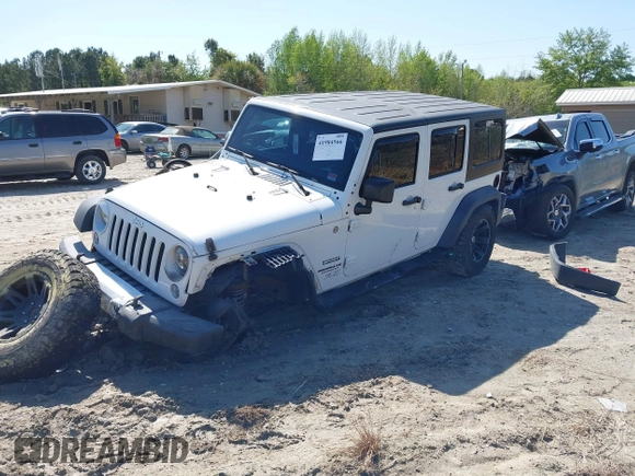 2015 Jeep Wrangler Unlimited Willys Wheeler with VIN 1C4BJWDG0FL546000, listed as a IAAI auction lot 41984566 with 112,742 mi miles and . Bid and sale history available at DreamBid. Image 17.