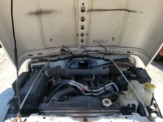 2001 Jeep Wrangler Sahara z VIN 1J4FA59S81P321490, wystawiony jako Copart lot #57320005 z przebiegiem 180 959 mil mil oraz Szkoda całkowita • Salvage title. Historia ofert i sprzedaży dostępna na DreamBid. Obrazek 11.