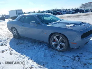 2021 Dodge Challenger R/T Scat Pack Widebody z VIN 2C3CDZFJ6MH583802, wystawiony jako IAAI lot #41317761 z przebiegiem 139 245 mil mil oraz . Historia ofert i sprzedaży dostępna na DreamBid. Obrazek 1.