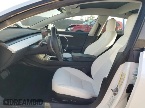 2022 Tesla Model 3 Long Range with VIN 5YJ3E1EB2NF199141, listed as a Copart auction lot 53069145 with 67,140 mi miles and Non Repairable. Bid and sale history available at DreamBid. Image 7.