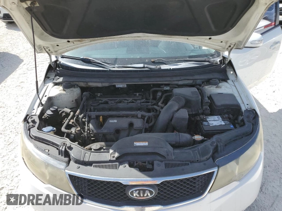 2010 Kia Forte EX with VIN KNAFU4A22A5184977, listed as a Copart auction lot 77189024 with Not Provided miles and Clean Title. Bid and sale history available at carsss.com. Image 11.