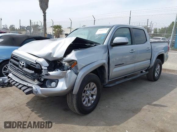 2017 Toyota Tacoma SR5 z VIN 3TMAZ5CN0HM038271, wystawiony jako IAAI lot #42042570 z przebiegiem 81 978 mil mil oraz . Historia ofert i sprzedaży dostępna na DreamBid. Obrazek 17.