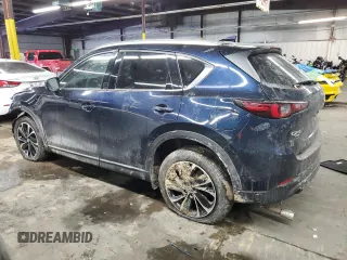 2023 Mazda CX-5 2.5 S Premium Package with VIN JM3KFBDMXP0196966, listed as a Copart auction lot 41927495 with 19,687 mi miles and Salvage Title. Bid and sale history available at carsss.com. Image 2.