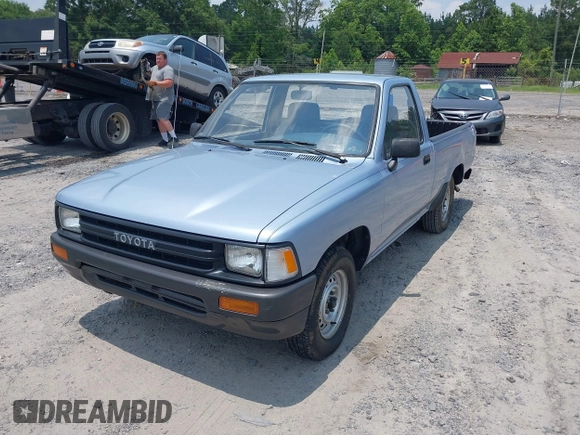 1990 Toyota Pickup z VIN JT4RN81R2L0043473, wystawiony jako IAAI lot #42410597 z przebiegiem 27 697 mil mil oraz . Historia ofert i sprzedaży dostępna na DreamBid. Obrazek 2.