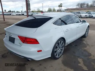 2014 Audi A7 3.0 Prestige with VIN WAU2GAFC7EN059419, listed as a IAAI auction lot 41702771 with 134,474 mi miles. Bid and sale history available at carsss.com. Image 4.