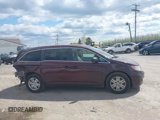 2013 Honda Odyssey LX with VIN 5FNRL5H28DB058401, listed as a IAAI auction lot 42050892 with 221,016 mi miles and . Bid and sale history available at carsss.com. Image 13.